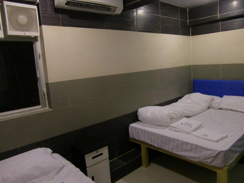 Kk Guesthouse Гонконг Номер фото